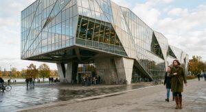 A professional editorial photograph capturing the geometric facade and clean modernist lines of a Wa